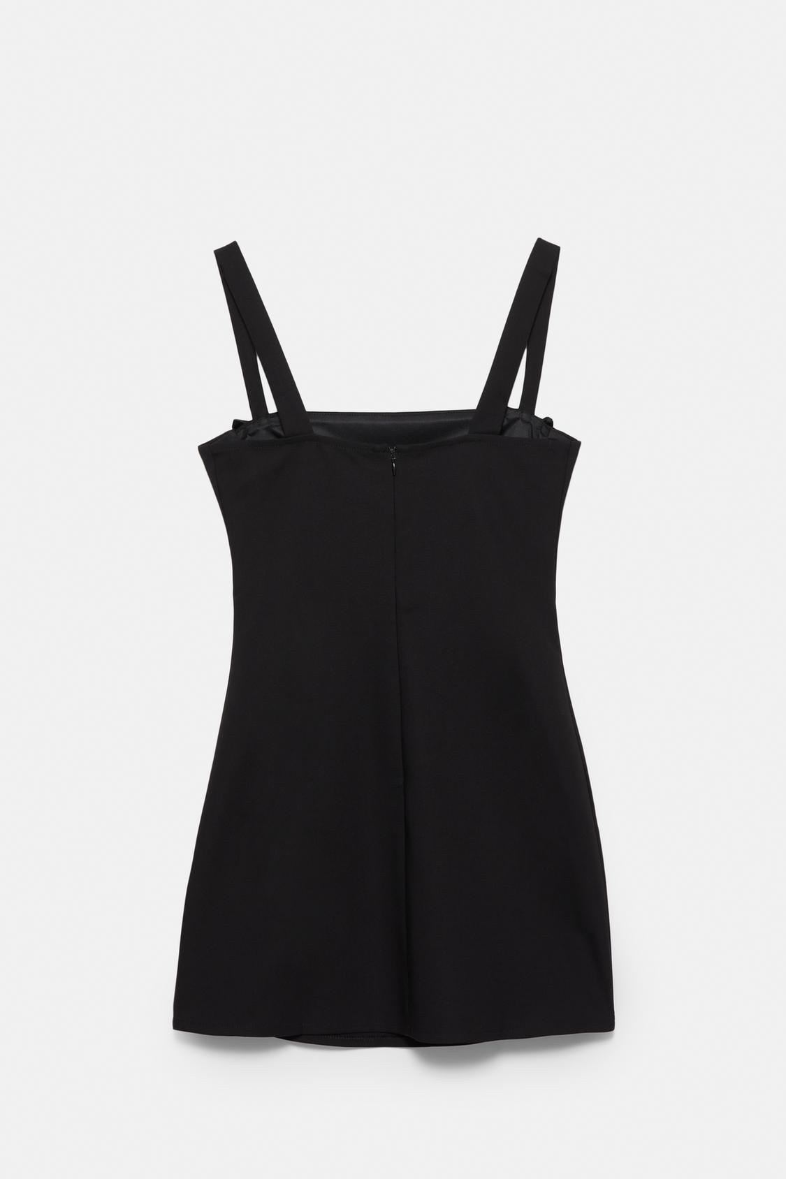 Short strappy dress with bows