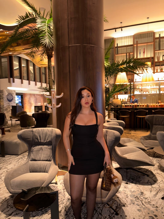 Short strappy dress with bows