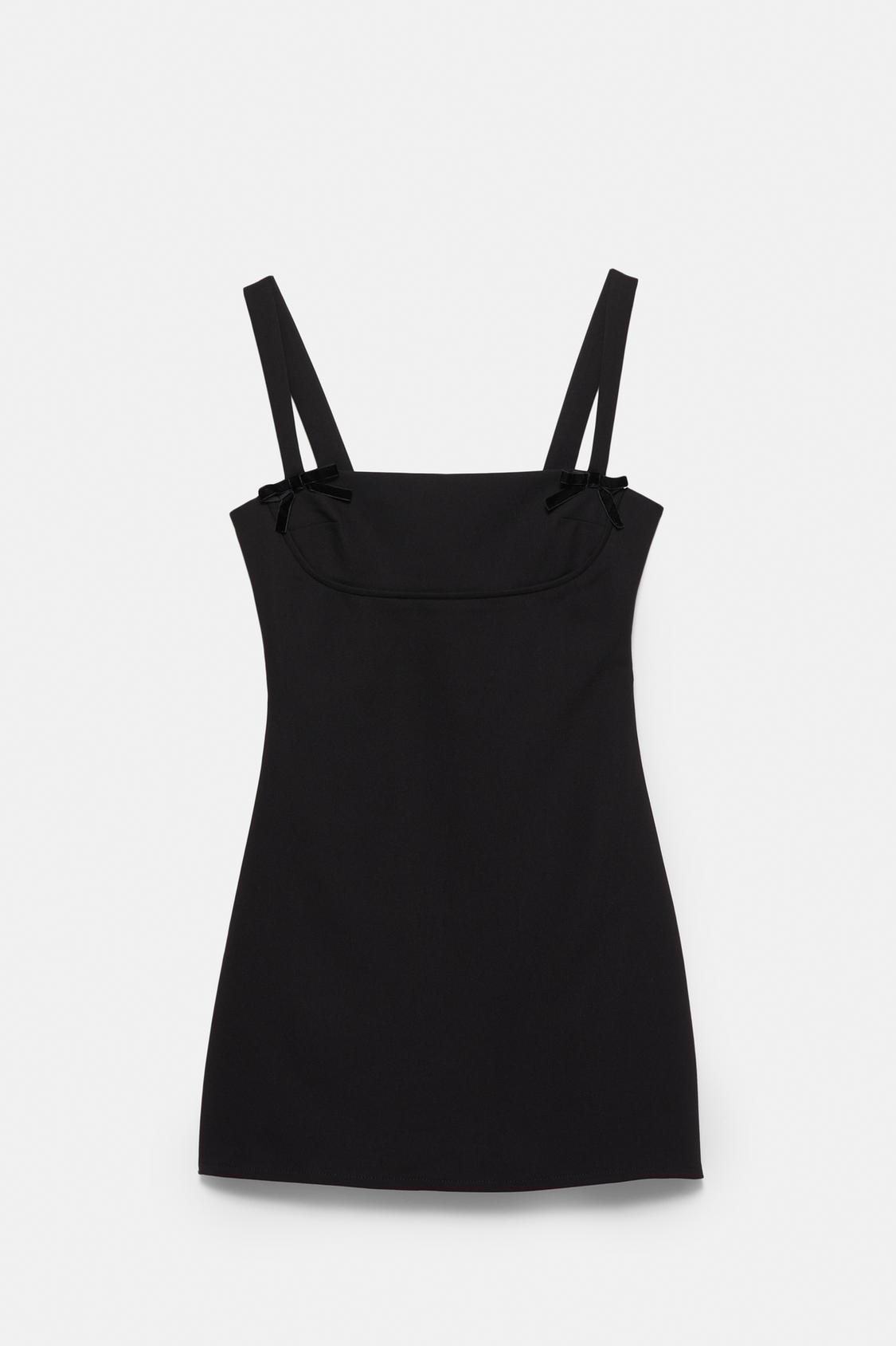 Short strappy dress with bows